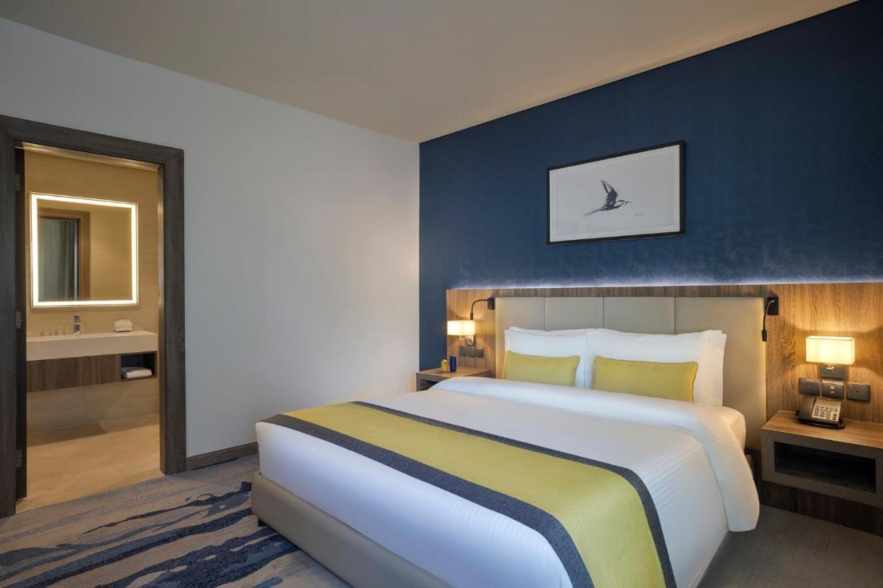 Voco Al Khobar By Ihg Hotel Exterior foto A bedroom at the hotel
